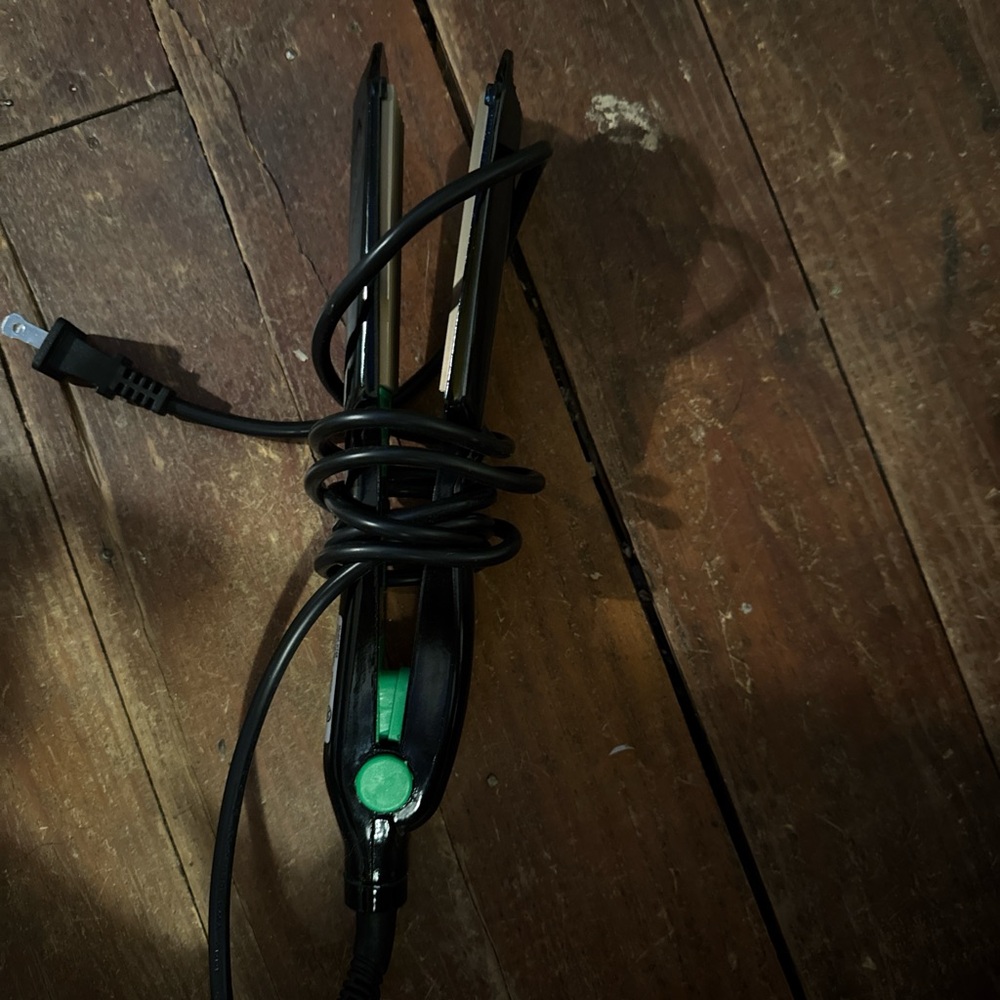 Black Hair Straightener with Green Button
